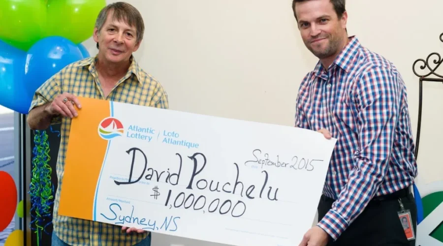 Million Dollar Winner Picks Up Cheque At ALC Headquarters