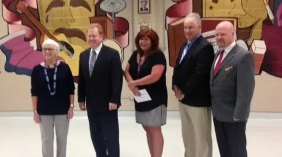 Minister Of Education and Early Childhood Development Tours Harrison Trimble