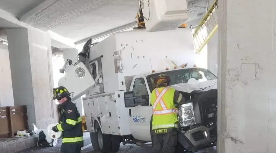 Truck Stuck Under City Subway Bridge