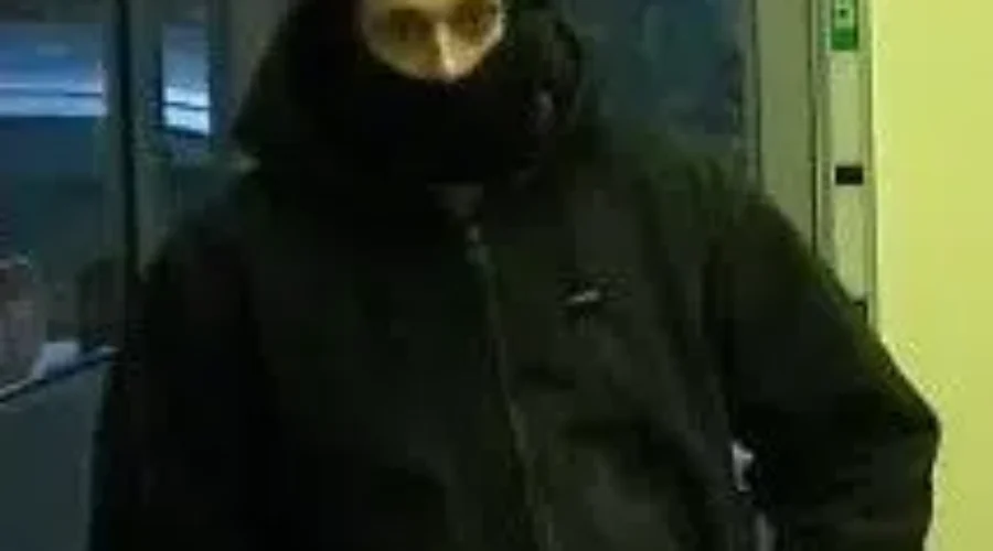 Suspect Sought In Armed Bank Robbery