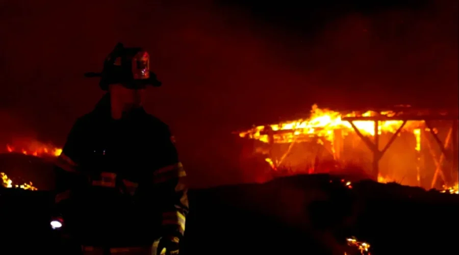 Firefighters Battle Challenging Structure And Grass Fires In Dry And Windy Conditions