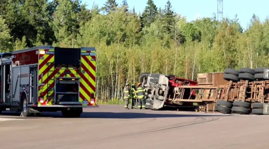 Transport Truck Rolls Over At Fuelling Station