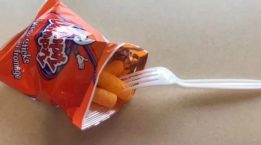 I take a lot of flak for eating cheesies with a fork