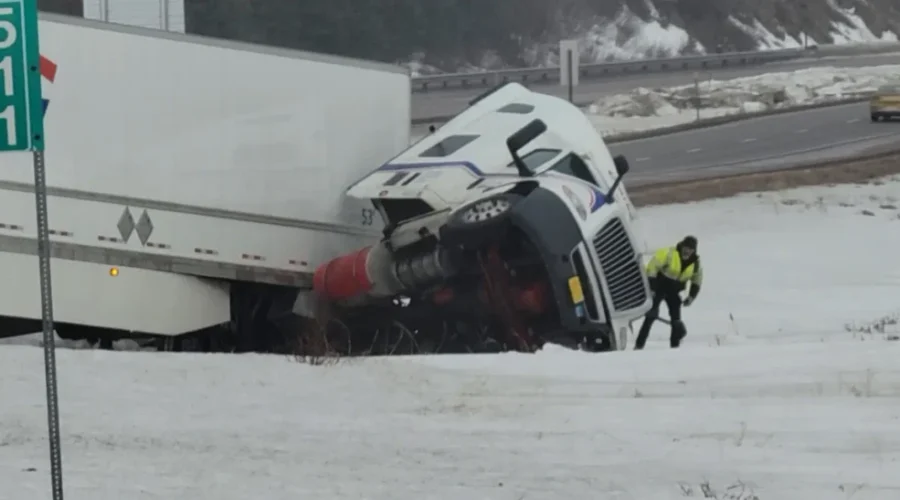 Wind Gusts And Blowing Snow Force Truck Off Highway