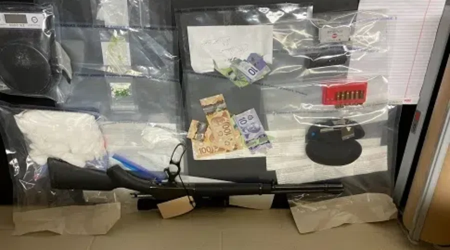 Man Charged After Drugs, Firearms Seized
