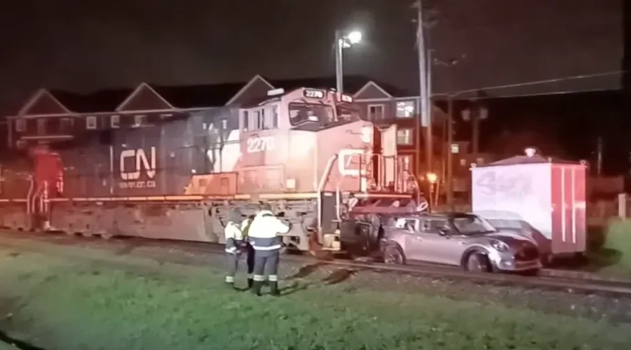 Abandoned vehicle struck by train in downtown Moncton