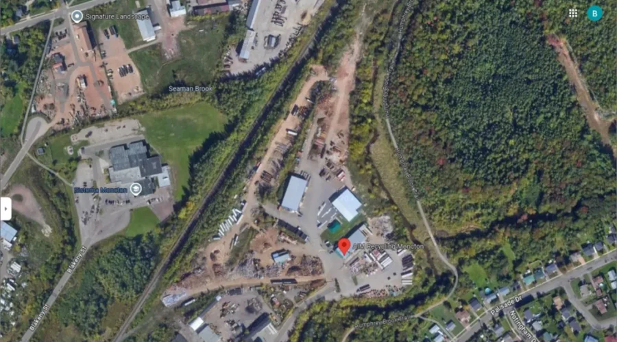 AIM building noise abatement wall at Moncton scrapyard
