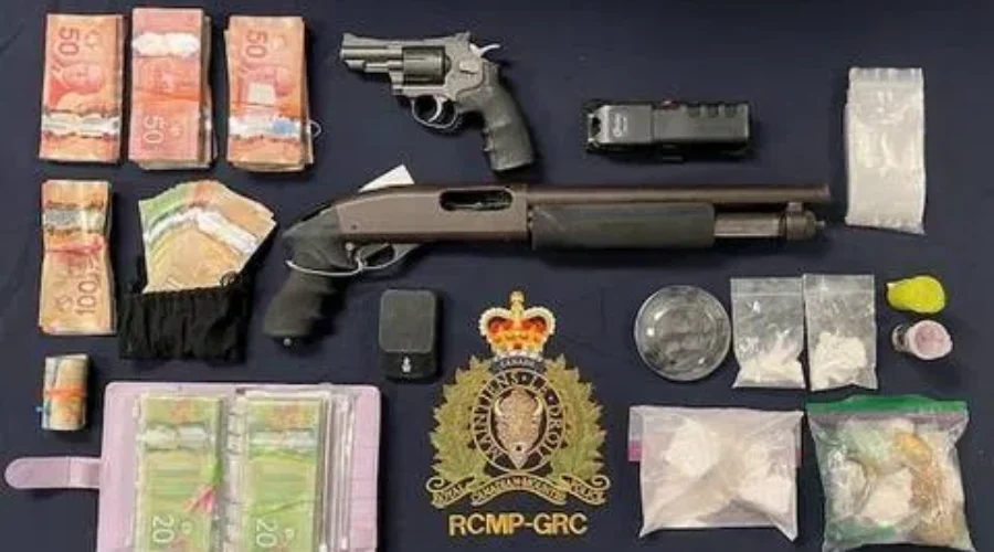 Drugs and weapons seized in trafficking investigation
