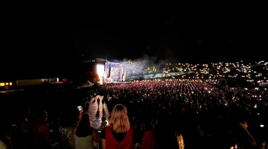 City officials smiling after Jonas Brothers concert in Moncton